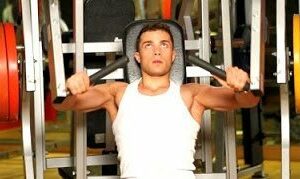 stock-footage-handsome-sporty-man-is-exercising-in-gym-centre